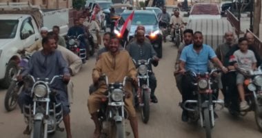 مسيرة دراجات نارية مسائية بقرى إسنا ترفع أعلام مصر في مشهد وطني مثير.. صور